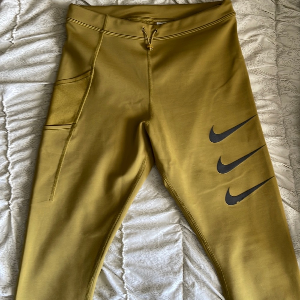 Nike womens Size Medium Mustard leggings